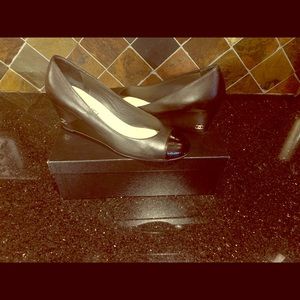 Chanel pumps. Black with black patent toe